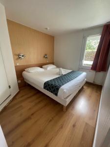 Postel nebo postele na pokoji v ubytování Fasthotel Annecy