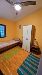 Postel nebo postele na pokoji v ubytování Apartment Zdenka + 37 fotografií