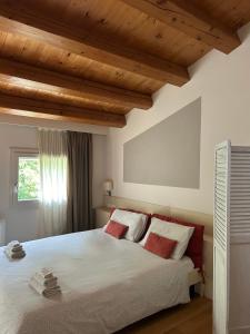 Posteľ alebo postele v izbe v ubytovaní BeeHouse - La Casa delle Api Agriturismo