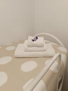Postel nebo postele na pokoji v ubytování Le Sirene Sweet Home