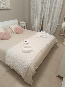 Postel nebo postele na pokoji v ubytování Le Sirene Sweet Home