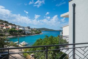 a view of a river from a balcony at Apartments Kate in Ražanj