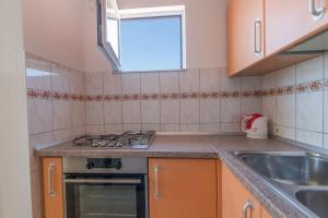 Kuchyňa alebo kuchynka v ubytovaní Apartments Ruze