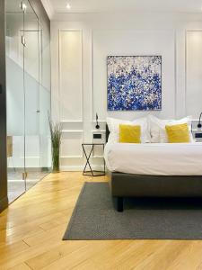 Posteľ alebo postele v izbe v ubytovaní Fingerprint Tree Apartments