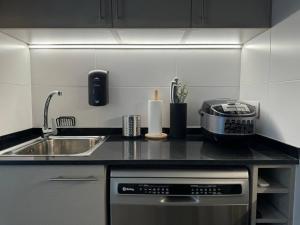 Köök või kööginurk majutusasutuses Modern Loft in Pas de la Casa, wifi, ski