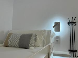 Voodi või voodid majutusasutuse Modern Loft in Pas de la Casa, wifi, ski toas
