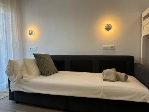 Voodi või voodid majutusasutuse Modern Loft in Pas de la Casa, wifi, ski toas