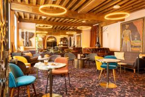 Posezení v ubytování Le Central Boutique Hôtel