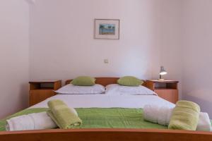 Posteľ alebo postele v izbe v ubytovaní Apartments Ruze