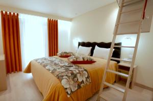 Ένα ή περισσότερα κρεβάτια σε δωμάτιο στο Casa 14 +9 φωτογραφίες