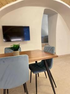 TV o dispositivi per l'intrattenimento presso Domus Parthenope Deluxe