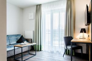 Ein Sitzbereich in der Unterkunft Gasthaus Forster am See - Eching bei Landshut