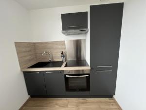 Kuchyň nebo kuchyňský kout v ubytování Ecrin Naturel - Studio 2p Montreuil-sur-Mer + 1 fotografie