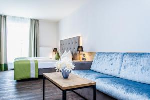Ein Sitzbereich in der Unterkunft Gasthaus Forster am See - Eching bei Landshut