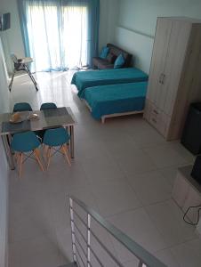 A bed or beds in a room at Lighthouse Apartments