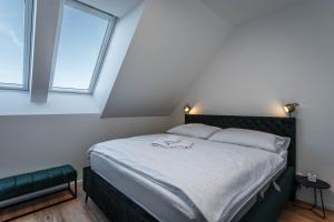 Postel nebo postele na pokoji v ubytování Residence Krušec
