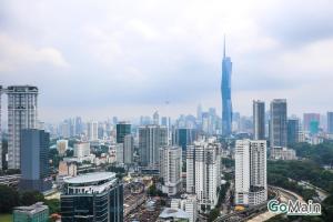 a view of a city with a lot of buildings at 24h Check in & SkyPool- KL Sentral Suite Riveria City Near KL Sentral KL KLCC in Kuala Lumpur