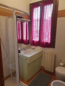 Koupelna v ubytování Salotto "900Strati" + 9 fotografií
