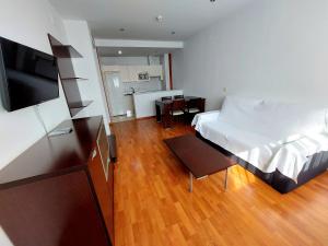 Postel nebo postele na pokoji v ubytování Domocenter Apartamentos Turísticos