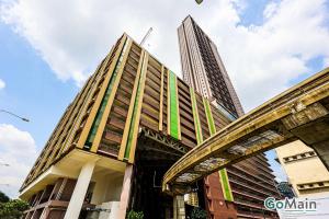 a building with tall buildings in the background at 24h Check in & SkyPool- KL Sentral Suite Riveria City Near KL Sentral KL KLCC in Kuala Lumpur