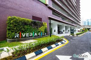 a building with a sign on the side of it at 24h Check in & SkyPool- KL Sentral Suite Riveria City Near KL Sentral KL KLCC in Kuala Lumpur