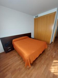 Postel nebo postele na pokoji v ubytování Domocenter Apartamentos Turísticos