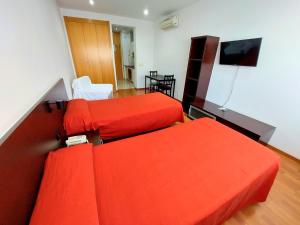 TV a/nebo společenská místnost v ubytování Domocenter Apartamentos Turísticos