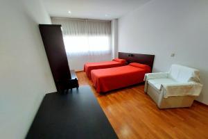 Postel nebo postele na pokoji v ubytování Domocenter Apartamentos Turísticos