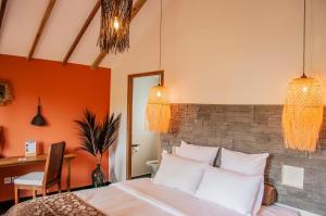 Postel nebo postele na pokoji v ubytování Heritage Ecolodge