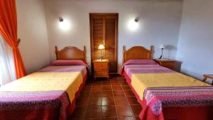 A bed or beds in a room at Pancho Molina