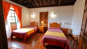 A bed or beds in a room at Pancho Molina