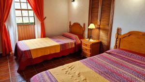 A bed or beds in a room at Pancho Molina