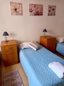 Postel nebo postele na pokoji v ubytování Malta Crown guesthouse