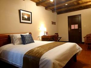 Postel nebo postele na pokoji v ubytování Mount Taiwu Cozy B&B + 30 fotografií