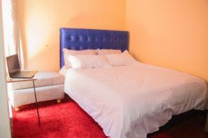 Ένα ή περισσότερα κρεβάτια σε δωμάτιο στο Zuri Home-Kimana