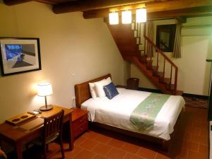 Letto o letti in una camera di Mount Taiwu Cozy B&B