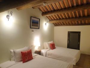 Letto o letti in una camera di Mount Taiwu Cozy B&B