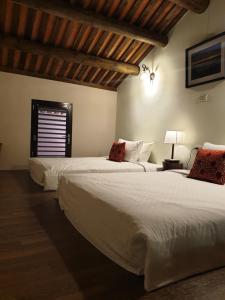 Letto o letti in una camera di Mount Taiwu Cozy B&B