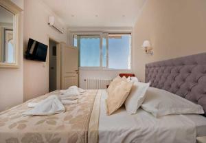 Postel nebo postele na pokoji v ubytování Apartments Draga
