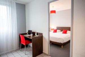 Postel nebo postele na pokoji v ubytování Comfort Aparthotel Besancon La City