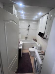 Koupelna v ubytování Saric LuxApartman