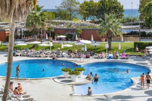 Bazén v ubytovaní Hotel Mercury by ALEGRIA alebo v jeho blízkosti
