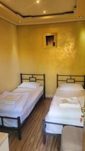 Voodi või voodid majutusasutuse DALLAR Guest House toas