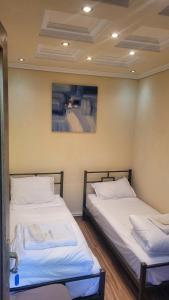 Voodi või voodid majutusasutuse DALLAR Guest House toas
