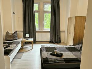 Postel nebo postele na pokoji v ubytování Monteurwohnung Burchard I Rosenau - Platz für 6 Personen