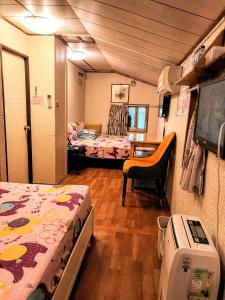 Postel nebo postele na pokoji v ubytování Yun Cheng Homestay