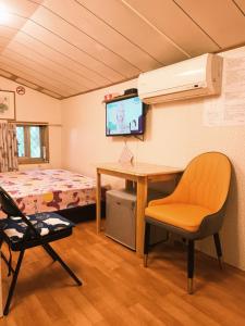 TV a/nebo společenská místnost v ubytování Yun Cheng Homestay