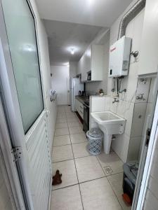 Η κουζίνα ή μικρή κουζίνα στο paz e tranquilidade +3 φωτογραφίες