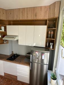 Kuchyňa alebo kuchynka v ubytovaní Apartament 18