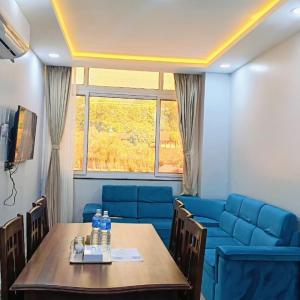TV a/nebo společenská místnost v ubytování Buigal Bagan Restaurent & Apartment